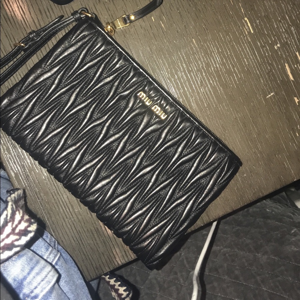 Black  authentic Miu miu clutch